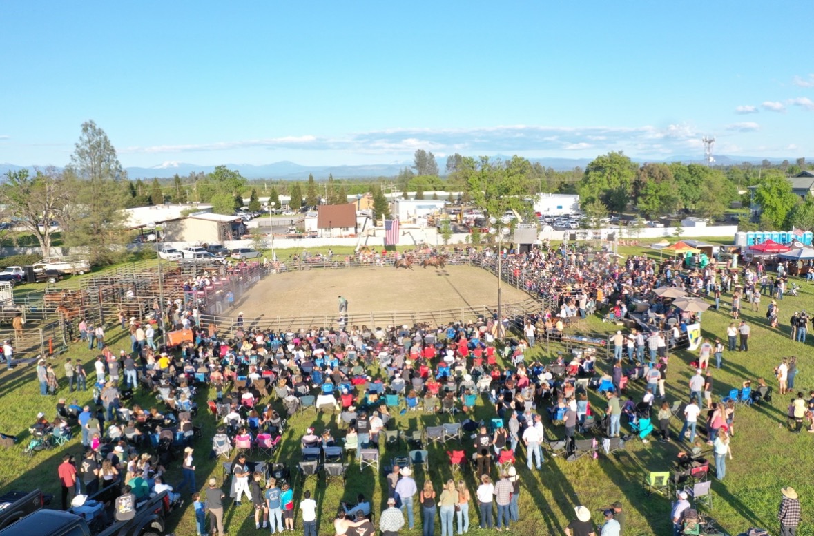 Aerial view of a Silver Bridge Rodeo Company arena and crowd
